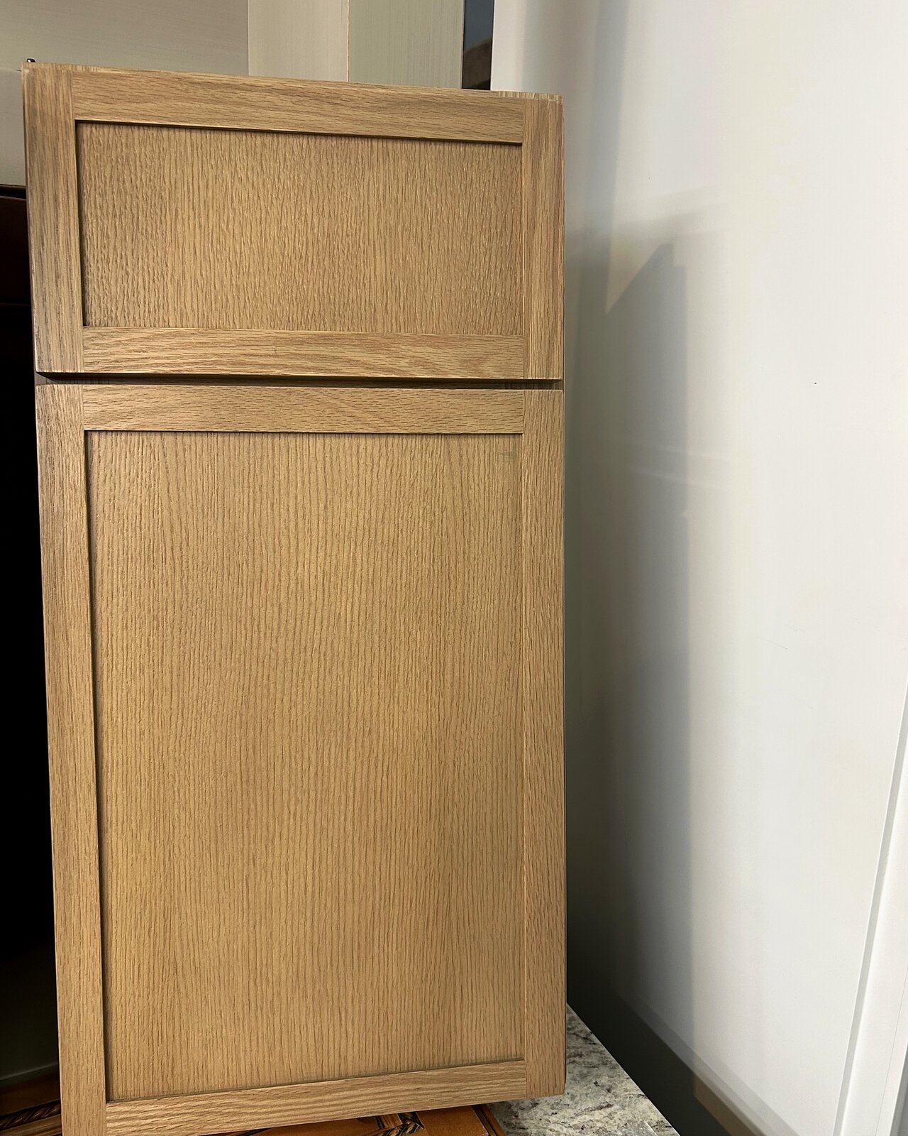 Petit Oak Shaker cabinet door by Forevermark — warm natural oak with subtle grain