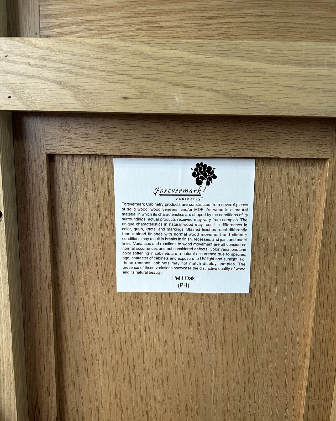 Forevermark Cabinetry label confirming Petit Oak (PH) door style